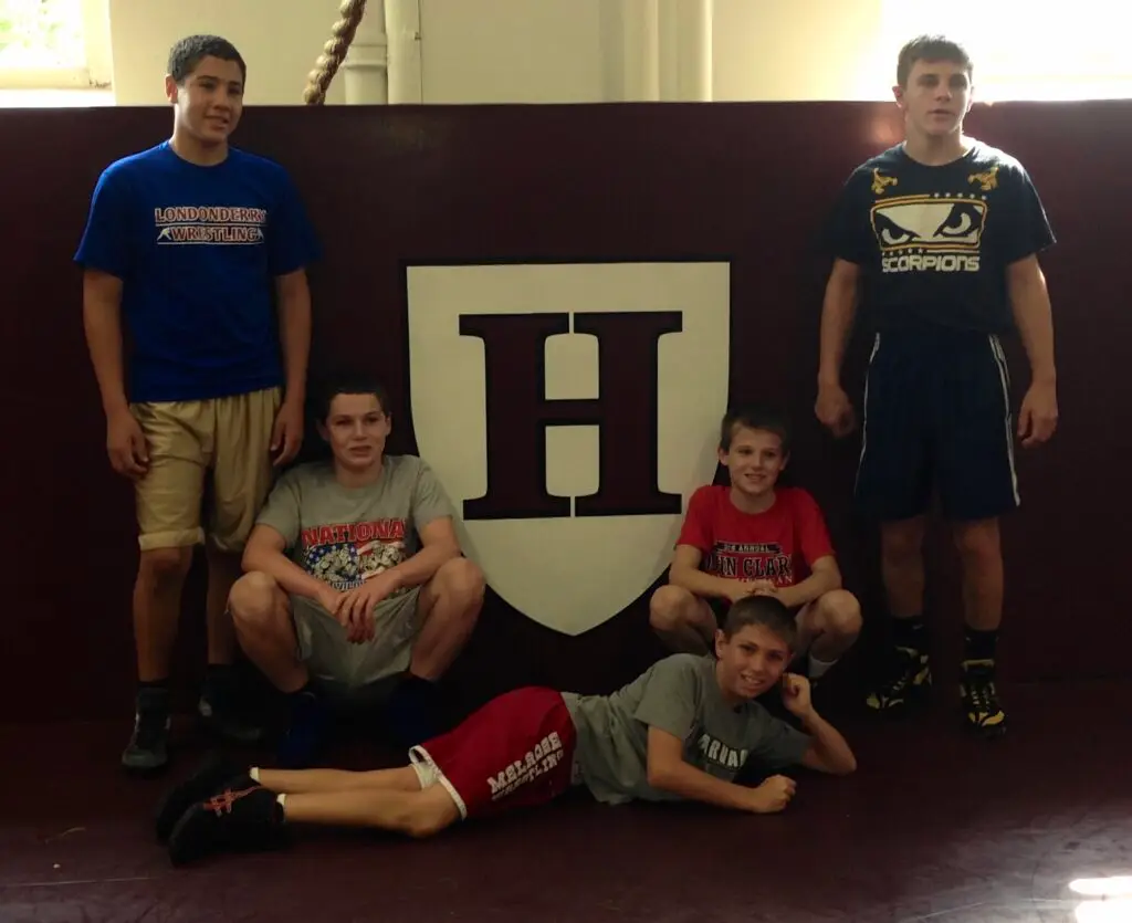 Young wrestler Andrew Fallon at Harvard University practice showing how youth wrestling builds discipline and focus for success in school