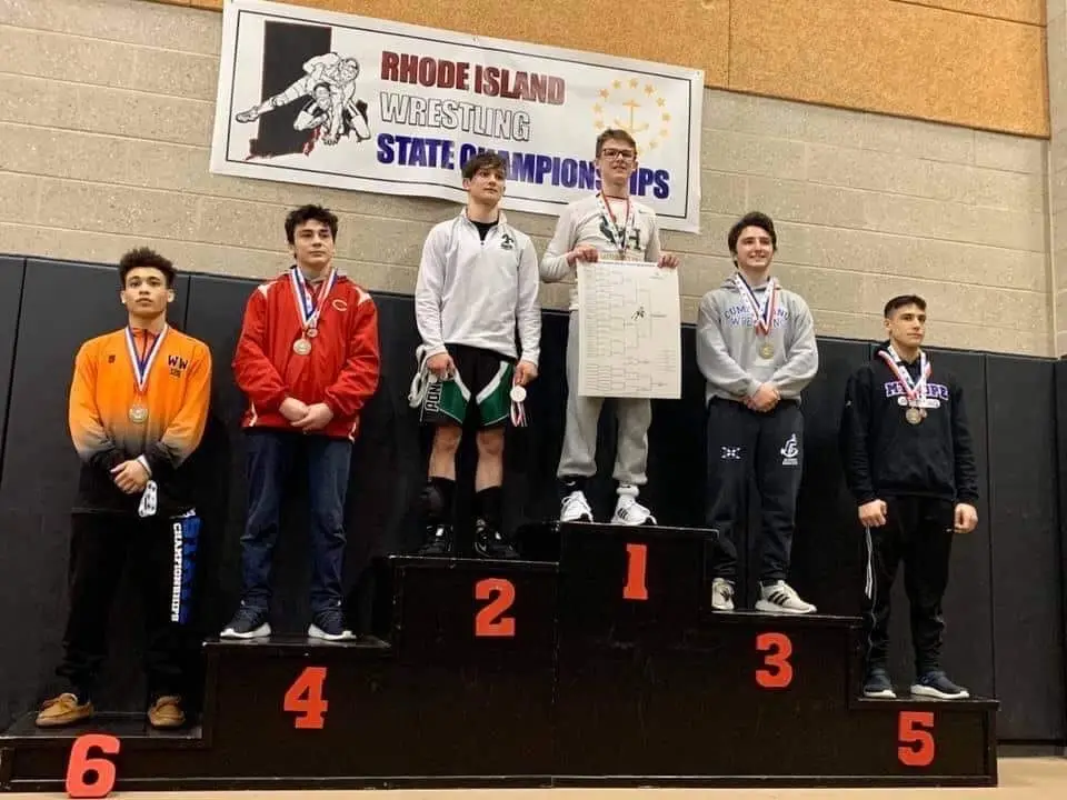 Andrew Fallon Rhode Island State High School Wrestling Champion on the podium - Shamrock Wrestling Club founder and Bristol Warren RI youth wrestling coach