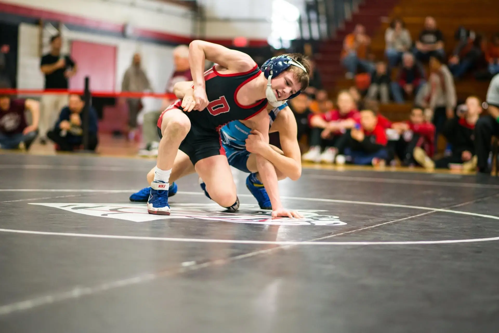 Young wrestler competing during a youth wrestling practice at Shamrock Wrestling Club in Somerset MA
