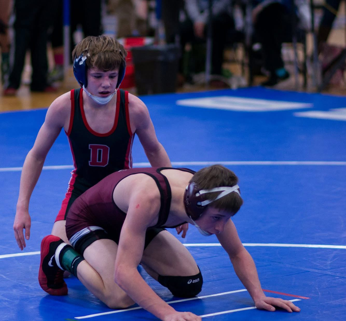 Andrew Fallon wrestling in his Durfee High School singlet at a tournament - Fall River native and founder of Shamrock Wrestling Club